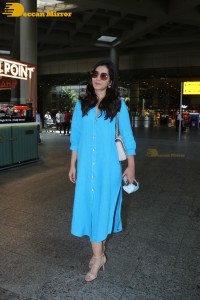 Raashi Khanna in a blue dress at the Mumbai Airport