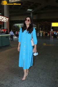 Raashi Khanna in a blue dress at the Mumbai Airport