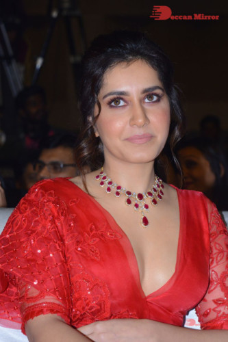 Telugu Actress Raashi Khanna looking beautiful in a red dress at a movie function