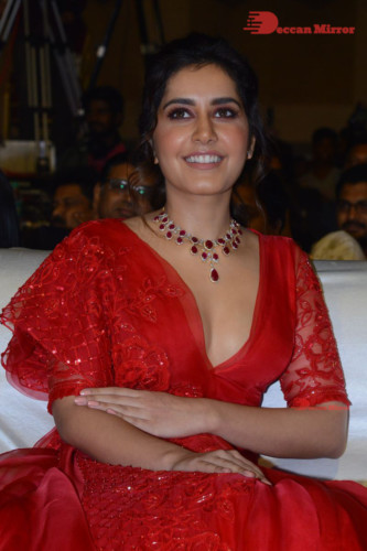 Telugu Actress Raashi Khanna looking beautiful in a red dress at a movie function