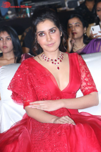 Telugu Actress Raashi Khanna looking beautiful in a red dress at a movie function
