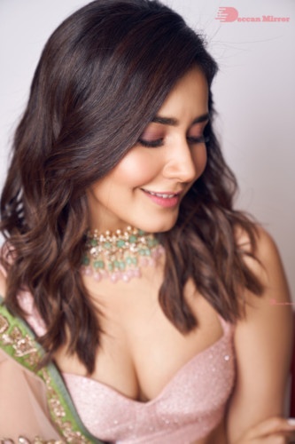 Actress Raashi Khanna in a pink lehenga choli dress