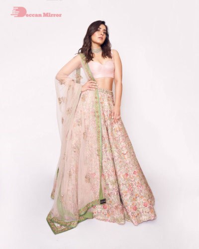 Actress Raashi Khanna in a pink lehenga choli dress