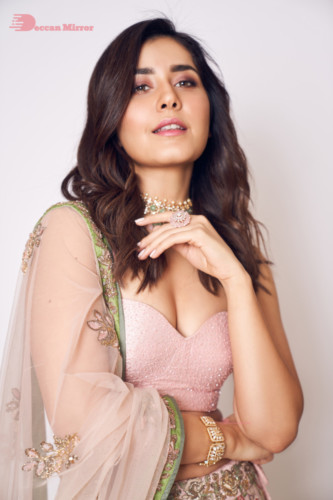 Actress Raashi Khanna in a pink lehenga choli dress