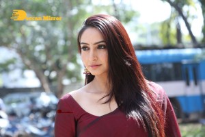 Actress Ragini Dwivedi in a brownish red saree