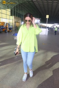 rakul preet singh in a green shirt and blue denim jeans