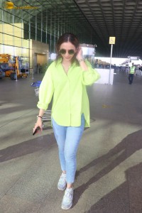 rakul preet singh in a green shirt and blue denim jeans