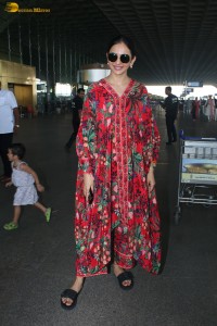 actress Rakul Preet Singh in a colorful attire at airport