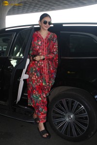 actress Rakul Preet Singh in a colorful attire at airport