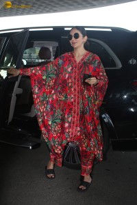 actress Rakul Preet Singh in a colorful attire at airport