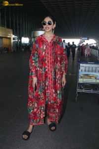 actress Rakul Preet Singh in a colorful attire at airport