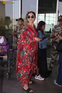 actress Rakul Preet Singh in a colorful attire at airport