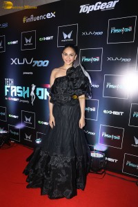 actress Rakul Preet Singh stunning in a black dress doing a ramp walk