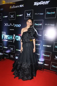 actress Rakul Preet Singh stunning in a black dress doing a ramp walk