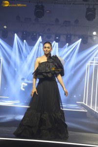 actress Rakul Preet Singh stunning in a black dress doing a ramp walk