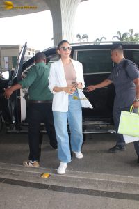 actress Rakul Preet Singh stylish looks in white shirt and denim jeans