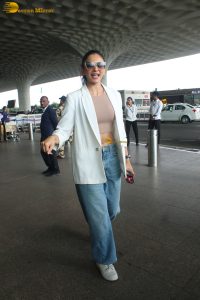 actress Rakul Preet Singh stylish looks in white shirt and denim jeans