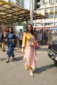 actress Rakul Preet Singh beautiful in a yellow salwar dress