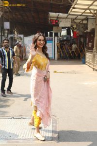 actress Rakul Preet Singh beautiful in a yellow salwar dress