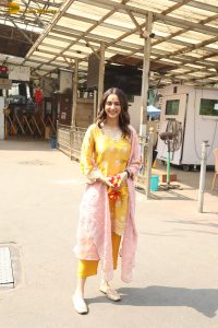 actress Rakul Preet Singh beautiful in a yellow salwar dress