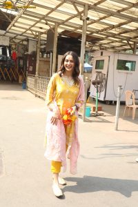 actress Rakul Preet Singh beautiful in a yellow salwar dress