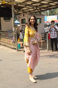 actress Rakul Preet Singh beautiful in a yellow salwar dress