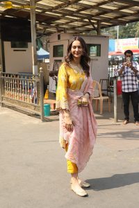 actress Rakul Preet Singh beautiful in a yellow salwar dress