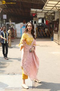 actress Rakul Preet Singh beautiful in a yellow salwar dress