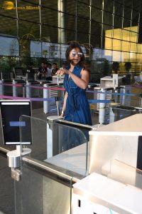 actress Rakul Preet Singh in a sleeveless blue denim shirt