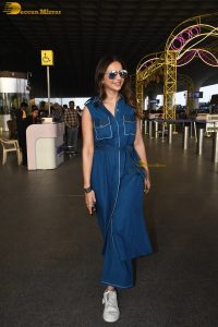 actress Rakul Preet Singh in a sleeveless blue denim shirt