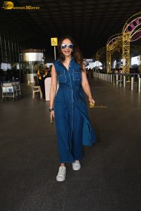 actress Rakul Preet Singh in a sleeveless blue denim shirt