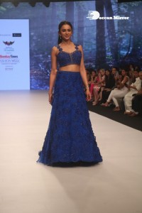 Rakul Preet Singh walks the ramp in a blue lehenga choli at the Bombay Times fashion week