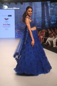 Rakul Preet Singh walks the ramp in a blue lehenga choli at the Bombay Times fashion week