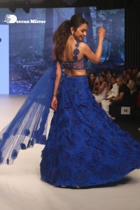 Rakul Preet Singh walks the ramp in a blue lehenga choli at the Bombay Times fashion week