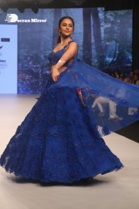 Rakul Preet Singh walks the ramp in a blue lehenga choli at the Bombay Times fashion week