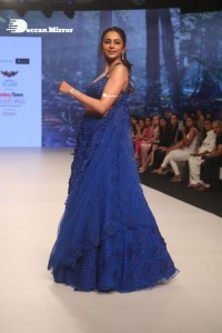 Rakul Preet Singh walks the ramp in a blue lehenga choli at the Bombay Times fashion week