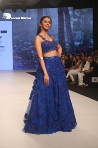 Rakul Preet Singh walks the ramp in a blue lehenga choli at the Bombay Times fashion week