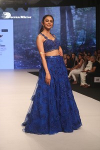 Rakul Preet Singh walks the ramp in a blue lehenga choli at the Bombay Times fashion week