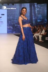 Rakul Preet Singh walks the ramp in a blue lehenga choli at the Bombay Times fashion week