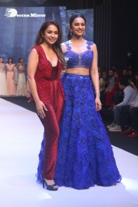 Rakul Preet Singh walks the ramp in a blue lehenga choli at the Bombay Times fashion week