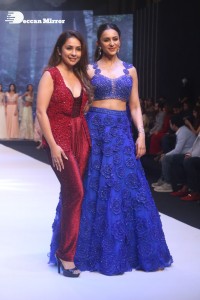 Rakul Preet Singh walks the ramp in a blue lehenga choli at the Bombay Times fashion week