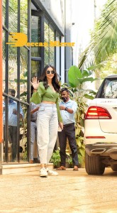 Rakul Preet Singh in a green top and blue jeans as she visits Maddock Films in Mumbai