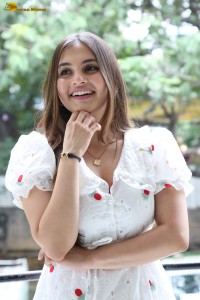 actress Ramya Pasupuleti beautiful in a white floral dress