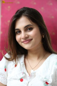 actress Ramya Pasupuleti beautiful in a white floral dress