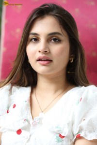 actress Ramya Pasupuleti beautiful in a white floral dress