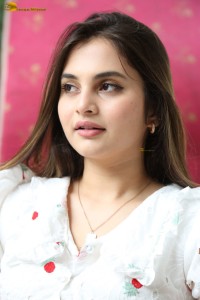 actress Ramya Pasupuleti beautiful in a white floral dress