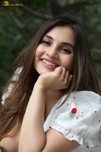 actress Ramya Pasupuleti beautiful in a white floral dress