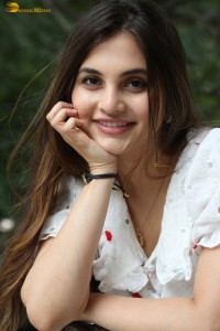 actress Ramya Pasupuleti beautiful in a white floral dress