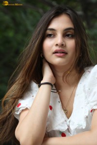 actress Ramya Pasupuleti beautiful in a white floral dress