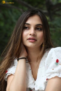 actress Ramya Pasupuleti beautiful in a white floral dress